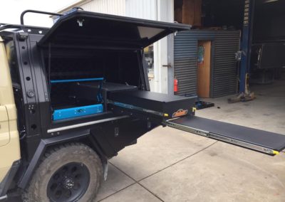 Lift-Off 1300 Long Canopy & Custom Tray on a Land Cruiser - 7